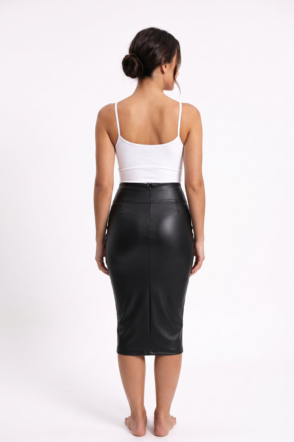 The Matte Leather Pencil Skirt in black, back view