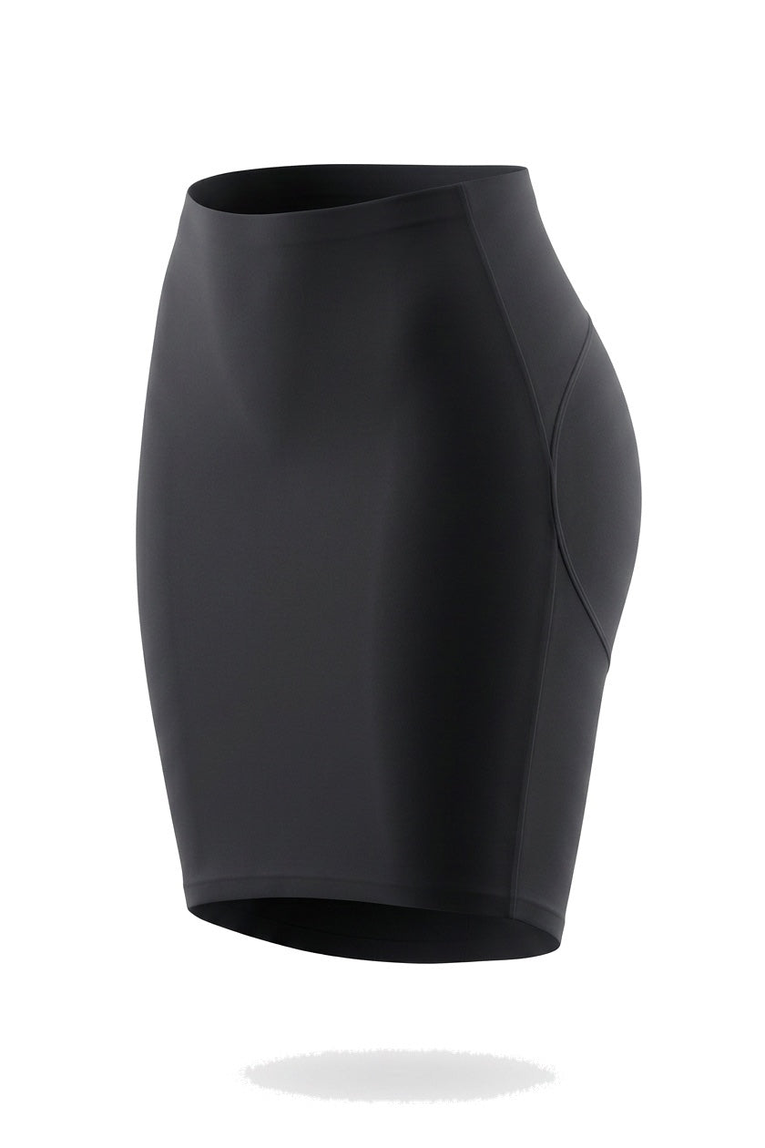The Seamless Slip Skirt in black, shown on an invisible form