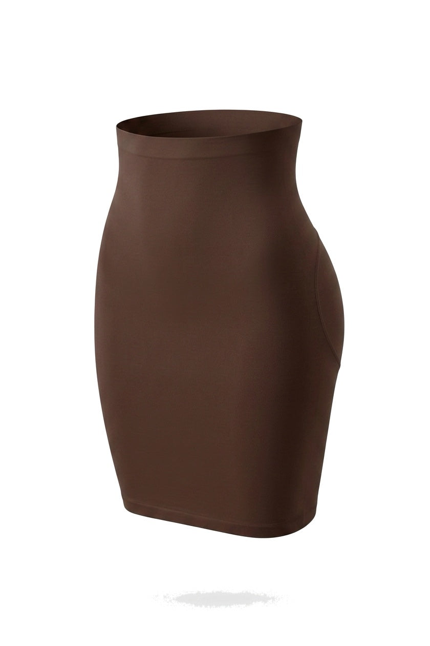 The Seamless Slip Skirt in coffee, shown on an invisible form