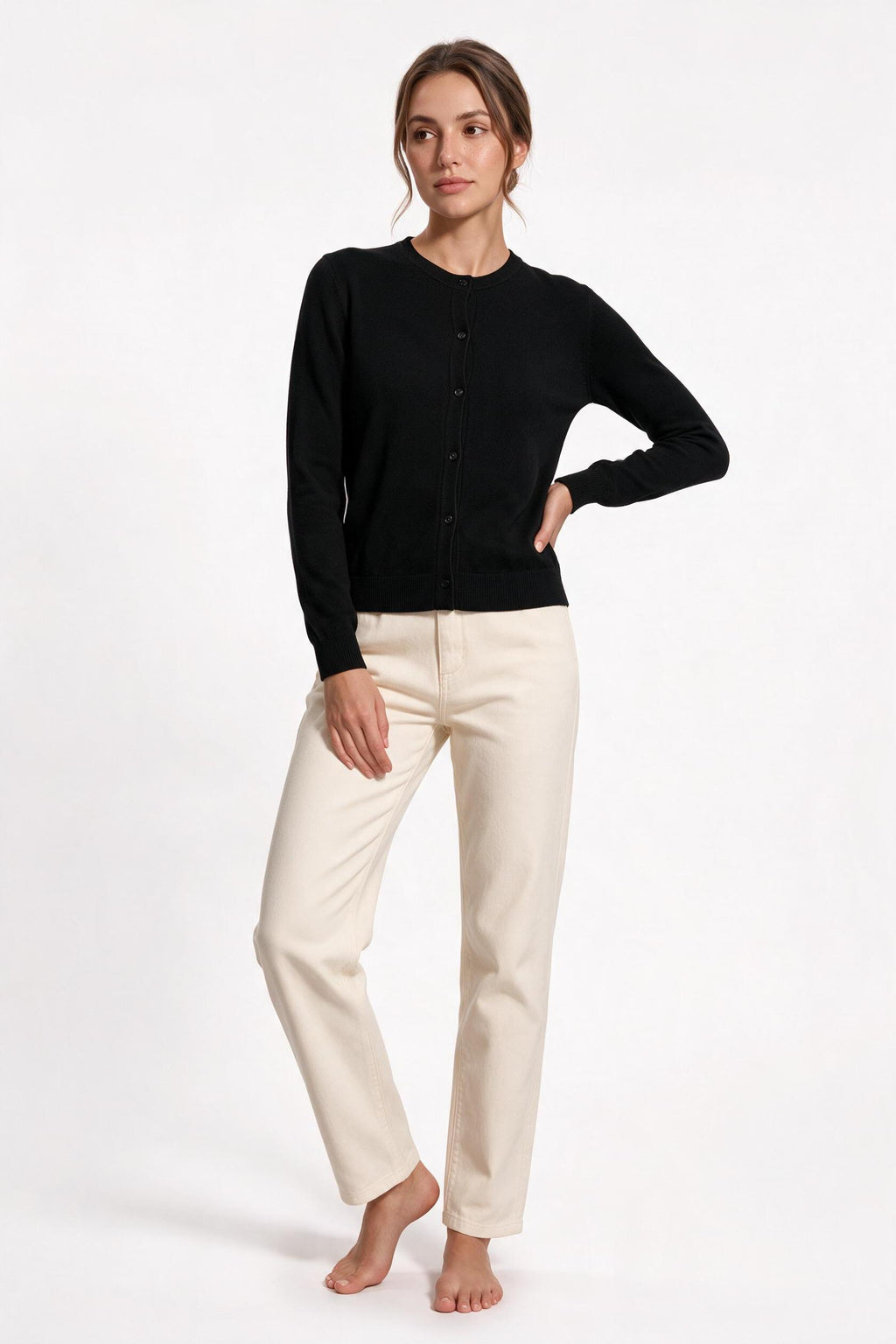 The Fine-Gauge Cardigan in black, front view, full length