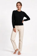 The Fine-Gauge Cardigan in black, front view, full length
