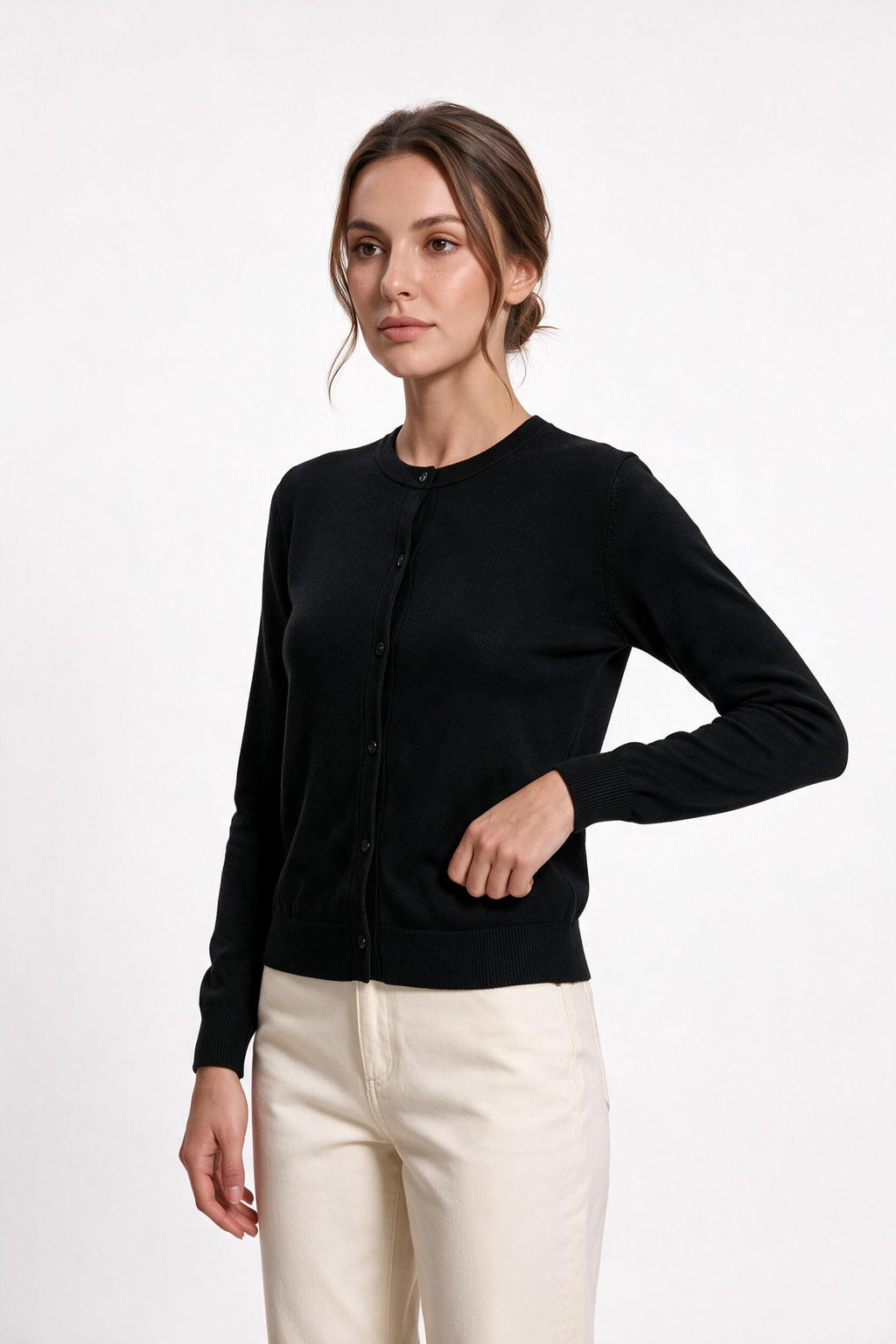 The Fine-Gauge Cardigan in black, side view