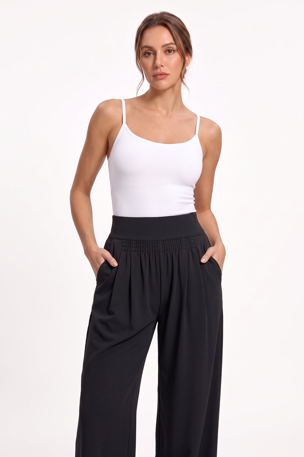 The Wide-Leg Trouser in black, three-quarter length view