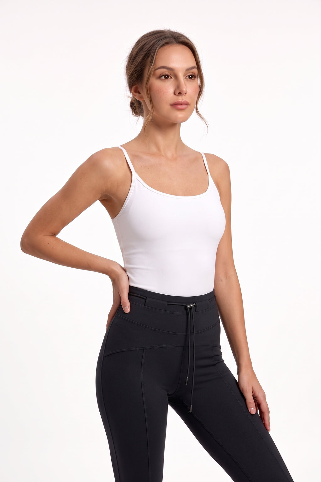 The Flare Legging in black, three-quarter length view