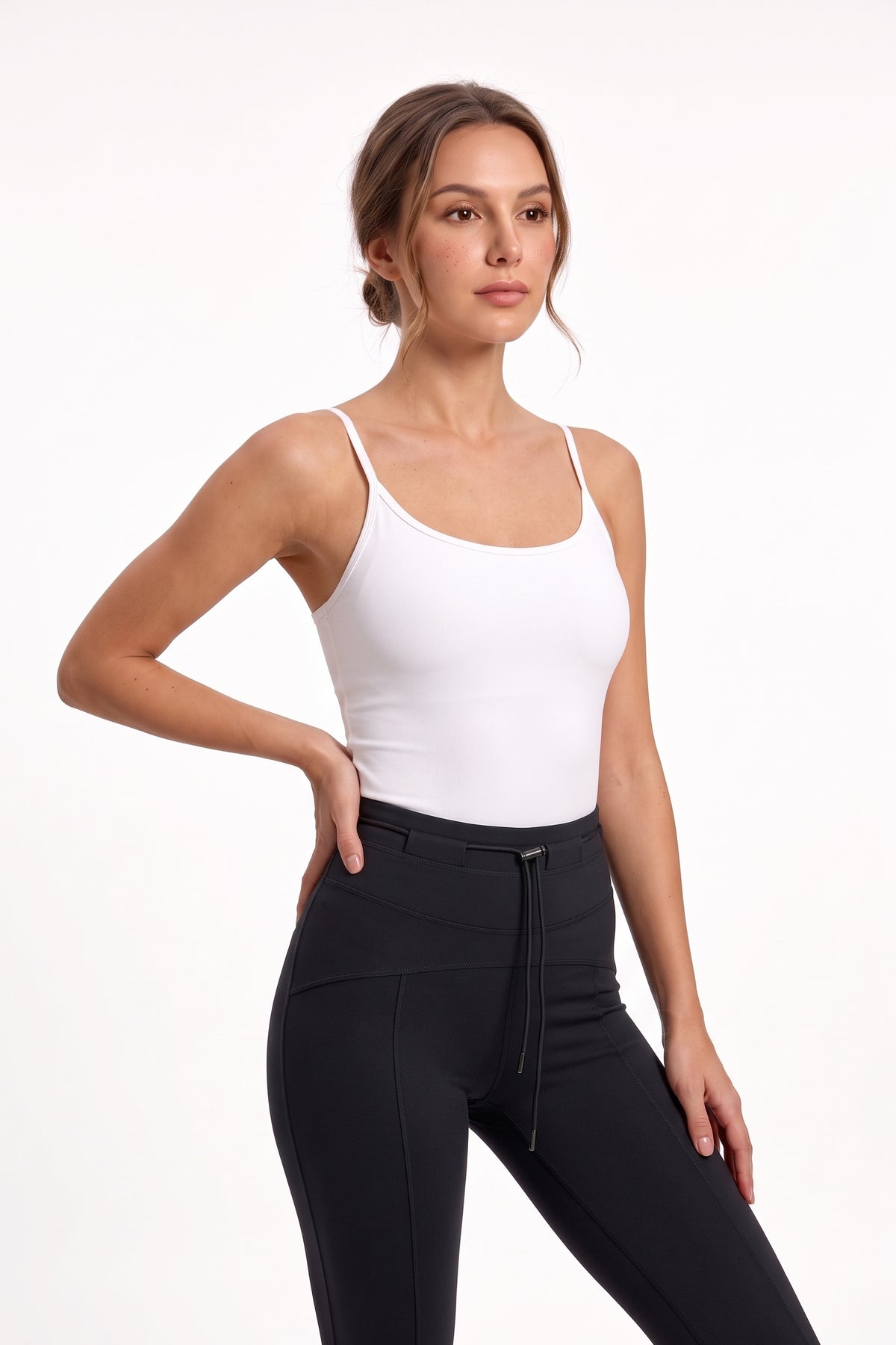 The Flare Legging in black, three-quarter length view