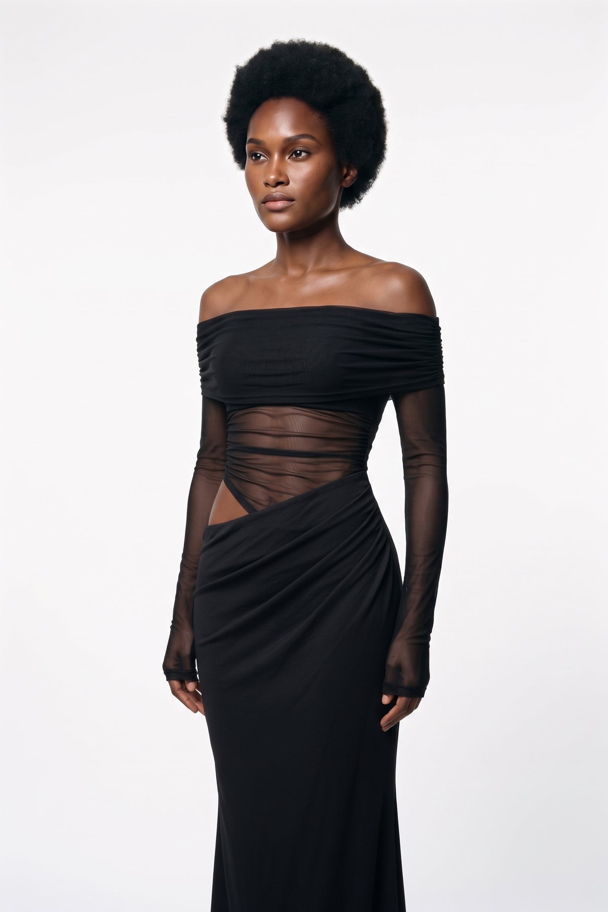 The Off-Shoulder Mesh Maxi Dress in black, three-quarter length view