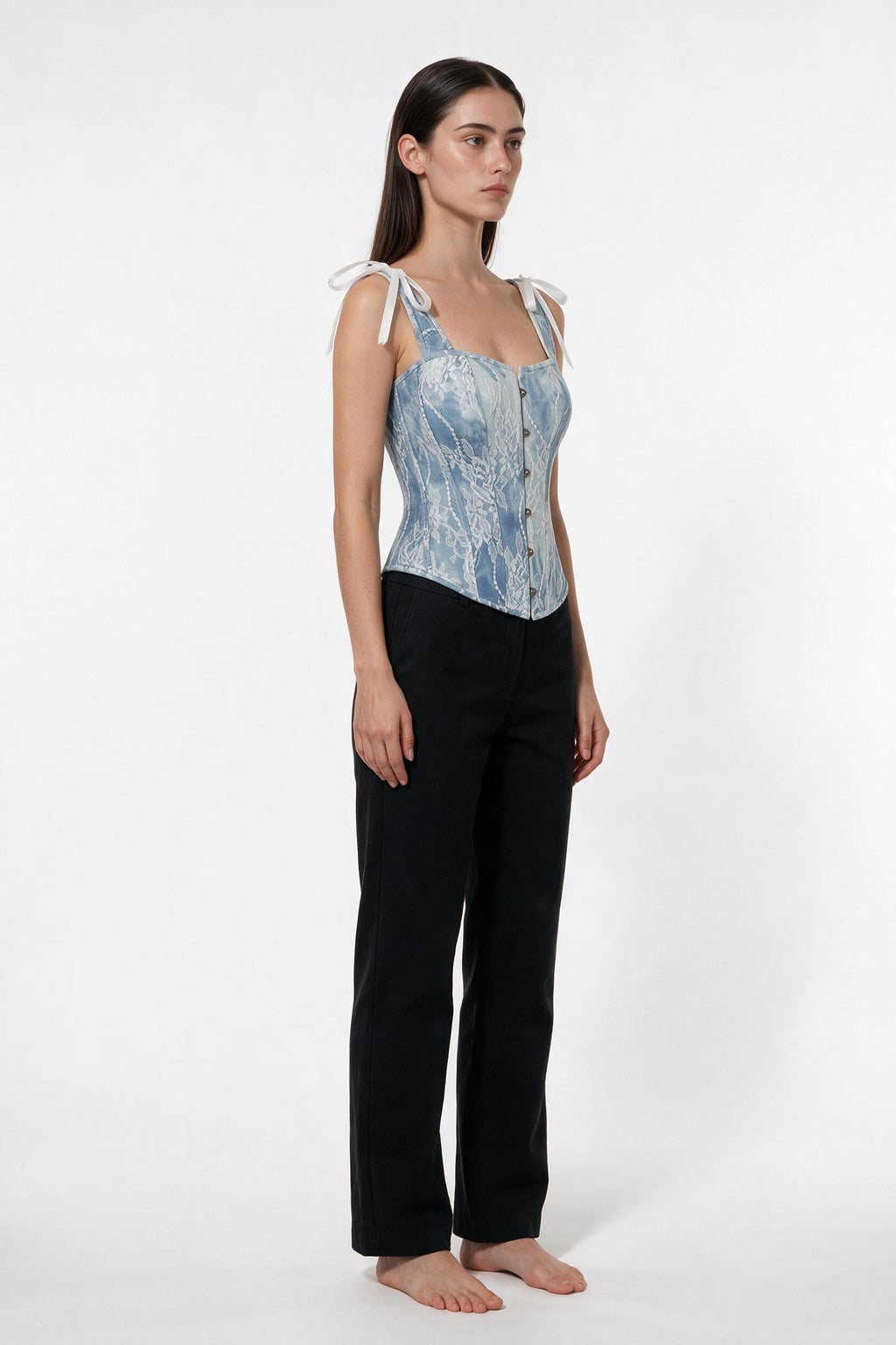 The Denim Lace Corset Top in light denim, side view