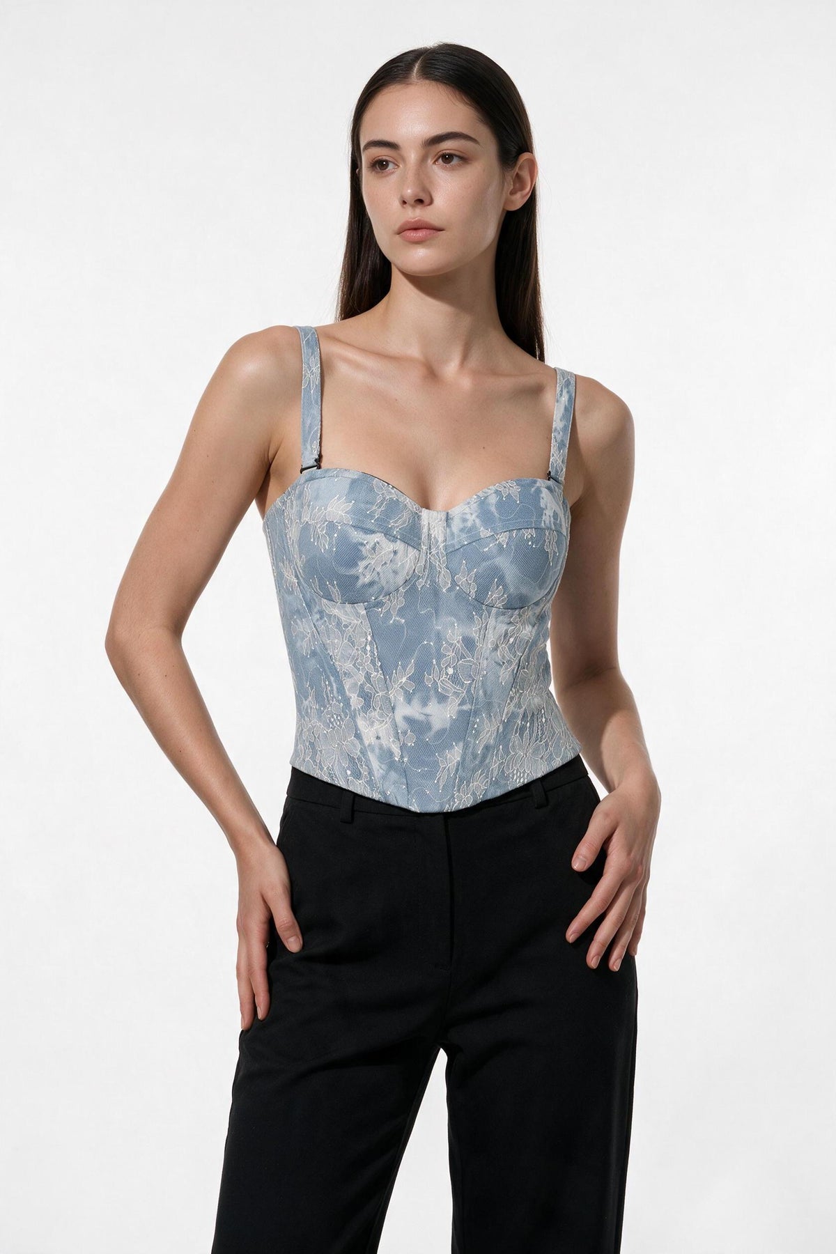 The Denim Lace Bustier in denim blue, three-quarter length view