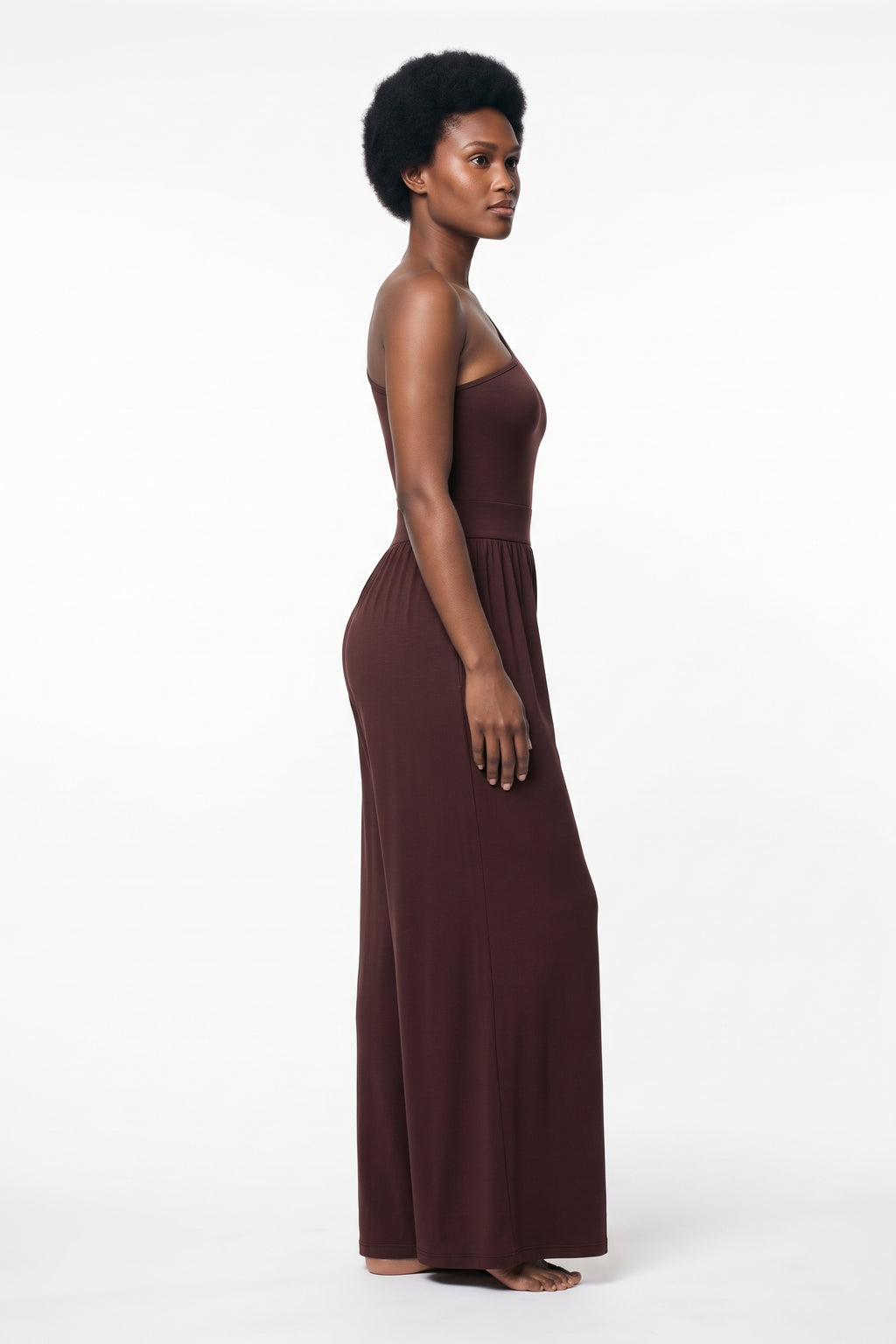 The One-Shoulder Wide-Leg Jumpsuit in burgundy, side view