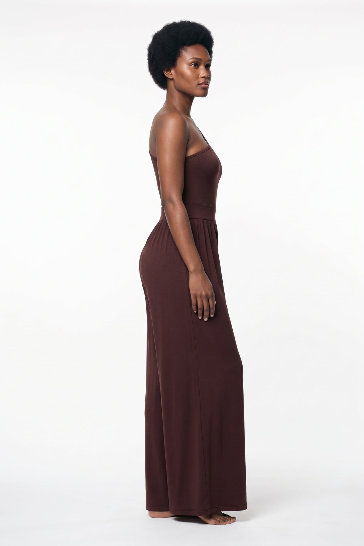 The One-Shoulder Wide-Leg Jumpsuit in burgundy, side view