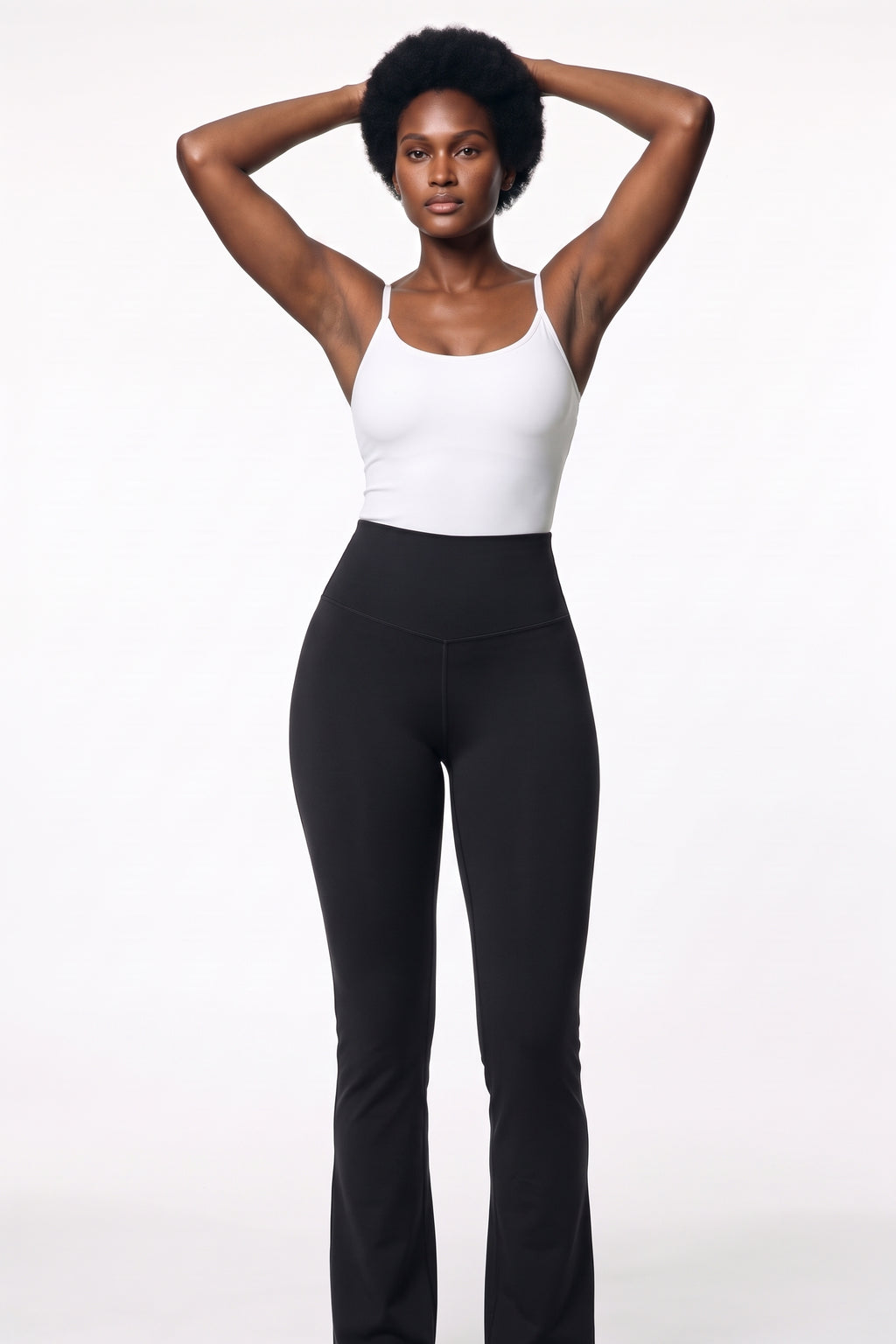The Contour Flare Legging in black, three-quarter length view