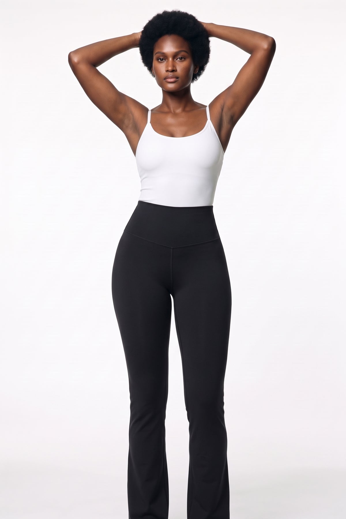 The Contour Flare Legging in black, three-quarter length view
